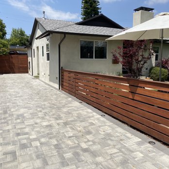 Value Up Renovation & Construction - After - new driveway, painted cement privacy wall with cedar topper, smooth stucco, painted trim, downspouts/gutters - General Contractors Near Me - Los Angeles, California Value Up Renovation & Construction - After - new driveway, painted cement privacy wall with cedar topper, smooth stucco, painted trim, downspouts/gutters - General Contractors Near Me - Los Angeles, California