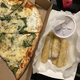 the pizza has a large flour spot and the mozzarella sticks are raw...