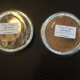two pies on a table two pies on a table