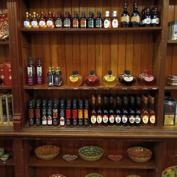 LIFeSTYLE - a wooden shelf with a variety of food and condiments - Cheese Shops Near Me - Bedford, Pennsylvania LIFeSTYLE - a wooden shelf with a variety of food and condiments - Cheese Shops Near Me - Bedford, Pennsylvania