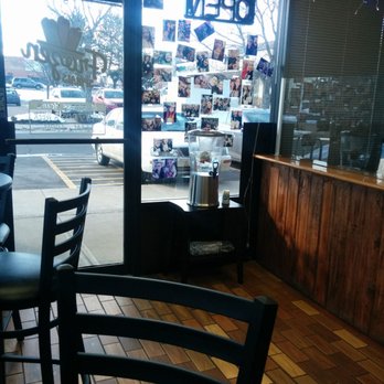 Frozen Spirals - The water dispenser and some of the photos on the window - Ice Cream & Frozen Yogurt Near Me - Westminster, Colorado