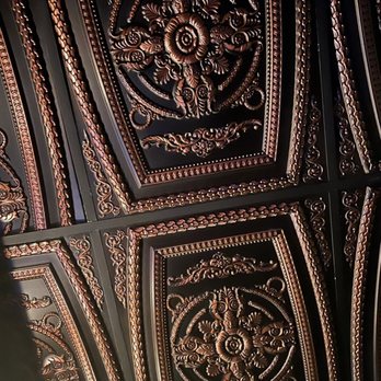 Teddy Roe's - a close up of a decorative ceiling - Speakeasies Near Me - Albuquerque, New Mexico Teddy Roe's - a close up of a decorative ceiling - Speakeasies Near Me - Albuquerque, New Mexico