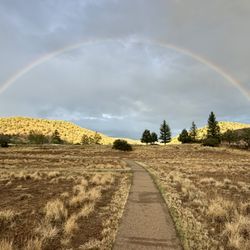 Ridgway State Park - August 13, 2026 - Rainbow over the beautiful park scenery.
