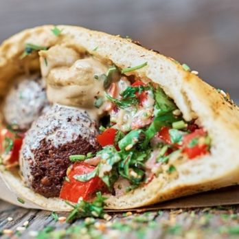 Broadway Bistro - Half Falafel Sandwich with falafel balls, hummus, chopped tomato, cucumber, parsley and tahini sauce. - Food Trucks Near Me