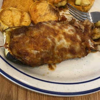 Giorgio Cafe - Delicious zucchini stuffed with fresh cut ground beef - Italian Near Me - Miami, Florida Giorgio Cafe - Delicious zucchini stuffed with fresh cut ground beef - Italian Near Me - Miami, Florida