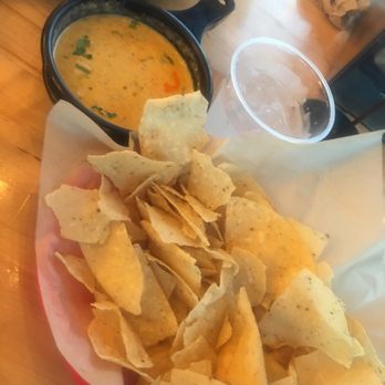 Torchy's Tacos - Queso with chips - Tacos Near Me - Houston, Texas Torchy's Tacos - Queso with chips - Tacos Near Me - Houston, Texas
