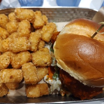 Main Event Wesley Chapel - Nashville hot chicken sandwich with tator tots - American Near Me - Lutz, Florida