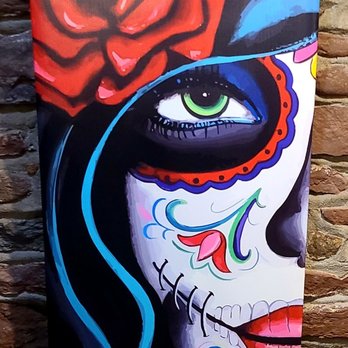 Cocina Del Sol - a painting of a woman with a rose in her hair - Mexican Near Me - Frenchtown, New Jersey