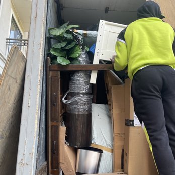 Green Line Relocation and Systems - Movers trying to avoid items falling on them due to poor packing. - Movers Near Me - Baltimore, Maryland Green Line Relocation and Systems - Movers trying to avoid items falling on them due to poor packing. - Movers Near Me - Baltimore, Maryland