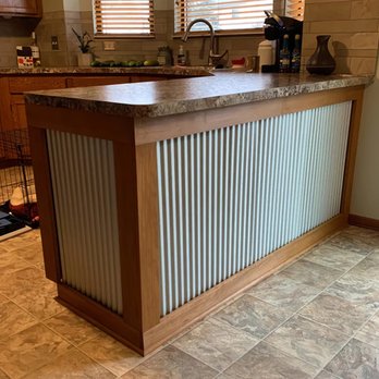 Ninja  Home Improvement -  kitchen island in the middle of a kitchen - General Contractors Near Me