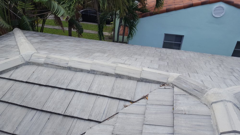 Slide of TNT Roofing