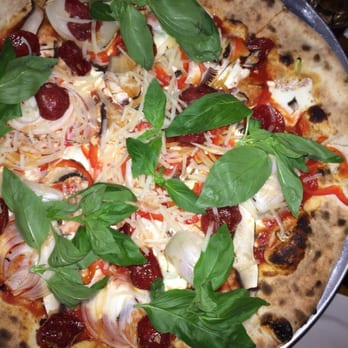 Lucali - Mushroom, onion, pepper and pepperoni pizza.  Small list of items selected for the day. - Pizza Near Me - Brooklyn, New York