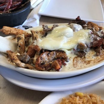 Birrieria Diaz - Queso dip. It's a white cheese dip with steak, chicken and chorizo!!! - Mexican Near Me - Bethany, Oklahoma Birrieria Diaz - Queso dip. It's a white cheese dip with steak, chicken and chorizo!!! - Mexican Near Me - Bethany, Oklahoma