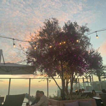The Rooftop Bar - Sunset view with purple twinkly and Edison lights! - Beer Bar Near Me - Oceanside, California The Rooftop Bar - Sunset view with purple twinkly and Edison lights! - Beer Bar Near Me - Oceanside, California