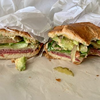 Lou's Cafe - Ami-Cado - Pastrami, Salami, Avocado, Pepper Jack Cheese, and Lou's Special Sauce on a Soft & Sweet Roll (minus a bite..) - Breakfast & Brunch Near Me - San Francisco, California Lou's Cafe - Ami-Cado - Pastrami, Salami, Avocado, Pepper Jack Cheese, and Lou's Special Sauce on a Soft & Sweet Roll (minus a bite..) - Breakfast & Brunch Near Me - San Francisco, California