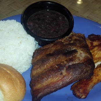Pollo Tropical - 1/4 chicken and Caribbean ribs. Well seasoned - Latin American Near Me - Brandon, Florida