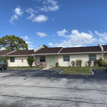Arch Creek Run Apartments - Apartment rear door with parking spot - Apartments Near Me - Melbourne, Florida Arch Creek Run Apartments - Apartment rear door with parking spot - Apartments Near Me - Melbourne, Florida