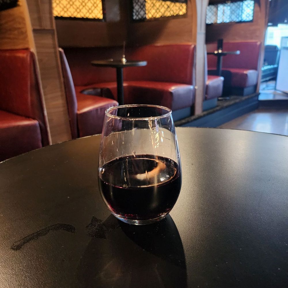 Lo-Bar Social - Vino with booths in the background. - Bars Near Me - Reno, Nevada Lo-Bar Social - Vino with booths in the background. - Bars Near Me - Reno, Nevada