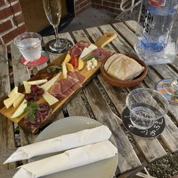 Mixed board with aged meats and cheeses. Mixed board with aged meats and cheeses.