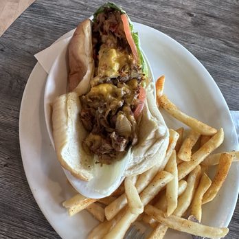 The Prime Smokehouse - Philly Cheese Brisket Sandwich - Barbeque Near Me - Rocky Mount, North Carolina The Prime Smokehouse - Philly Cheese Brisket Sandwich - Barbeque Near Me - Rocky Mount, North Carolina