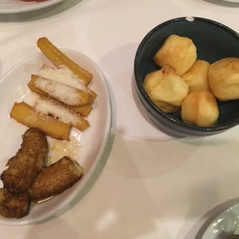 Fogo de Chão - The bread has a cheesy center??? I've not tried it before and Now I'm addicted! - Brazilian Near Me - Addison, Texas Fogo de Chão - The bread has a cheesy center??? I've not tried it before and Now I'm addicted! - Brazilian Near Me - Addison, Texas
