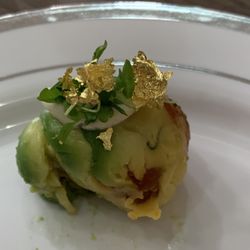 Tuna wrapped with avocado and gold flakes on top. Mmmmm......