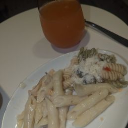 Greek pasta salad and "Chicken Georgia" with penne pasta. Greek pasta salad and "Chicken Georgia" with penne pasta.