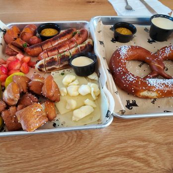 Prost Brewing Co - Sausage sampler with Strawberries cheese and pretzel bites. Currywurst, Jalapeño Buffalo, bratwurst, and one more I forgot. - Pubs Near Me - Wheat Ridge, Colorado Prost Brewing Co - Sausage sampler with Strawberries cheese and pretzel bites. Currywurst, Jalapeño Buffalo, bratwurst, and one more I forgot. - Pubs Near Me - Wheat Ridge, Colorado