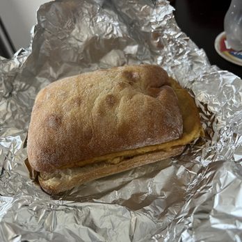 Amuni - Panelle Sandwich -- bland but better when I added some chili oil - Sicilian Near Me - Brooklyn, New York
