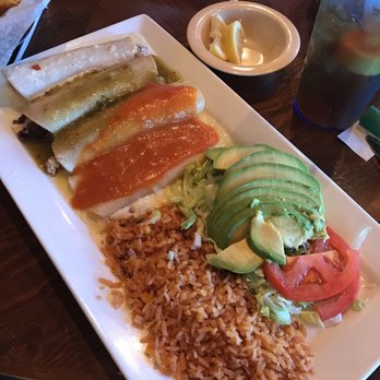 Patron Mexican Grill - Enchilada Special looks good enough to eat. I love that it has salad on the plate and a mixture of red and green sauce. It is very tasty. - Mexican Near Me - Conway, Arkansas