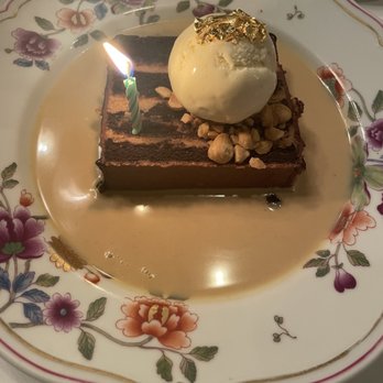 Carbone - Hazelnut chocolate cake with vanilla ice cream - delicious hazelnut crème anglaise to die for - Italian Near Me - New York, New York Carbone - Hazelnut chocolate cake with vanilla ice cream - delicious hazelnut crème anglaise to die for - Italian Near Me - New York, New York