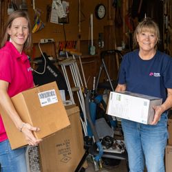Caring Transitions employees loading boxes