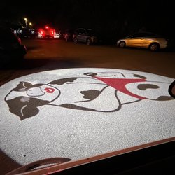 Happy Cow - Image in the parking lot.