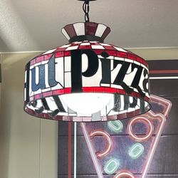 Pizza Hut - A light in the restaurant.
