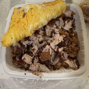 Dick's Lechon - Lechon Fried Rice with omelette moved to show lechon and fried rice. - Filipino Near Me - Waipahu, Hawaii