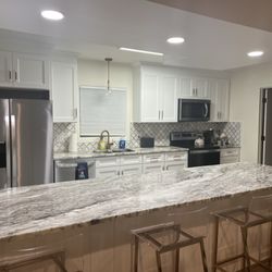 Uniqueness Bella Stone Surfaces - Airbnb waterfall island/kitchen remodel