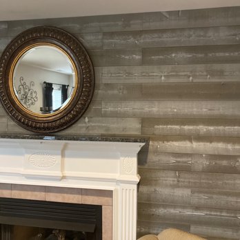 ENC Handyman Services - ENC Handyman installed this beautiful wood wall finish, and marble mantle on the fireplace. Top notch craftsmanship! Perfection! - Handyman Near Me