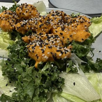 Crawford's Genuine - CRISPY SHRIMP LETTUCE WRAPS. Sriracha Mayo, Sesame Slaw, Thai Basil. Tasty but hard to eat. - Salad Near Me - Morrisville, North Carolina