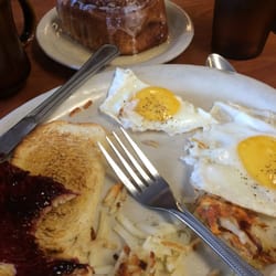 Sunny's Family Restaurant - The "lighter side" two eggs, the space that used to be a half order of has Browns, slice of sourdough toast and cinnamon roll.