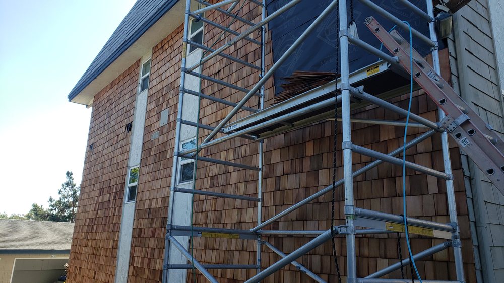 Slide of Rational Roofing Services