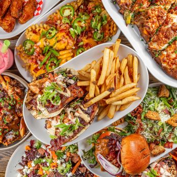 NOX Eatery & Public House - Overhead view of multiple dishes - Sports Bars Near Me - Ottawa, Ontario