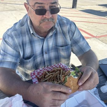 Arney’s Bayside Grill - Hubby couldn't wait to dig in! - Burgers Near Me - Galveston, Texas