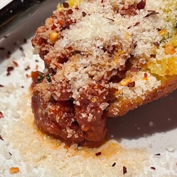 Bruschetta Francesca - Arancine (arancini) appetizer, with marinara and freshly grated Parmesan. - Italian Near Me - Key West, Florida