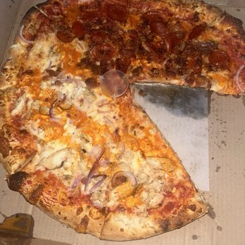 Fentoni’s Pizzeria - LARGE pizza (top half: pepperoni and bacon) red onions and buffalo sauce drizzle on whole pizza (bottom half: chicken, feta cheese) - Pizza Near Me - Carolina Beach, North Carolina Fentoni’s Pizzeria - LARGE pizza (top half: pepperoni and bacon) red onions and buffalo sauce drizzle on whole pizza (bottom half: chicken, feta cheese) - Pizza Near Me - Carolina Beach, North Carolina