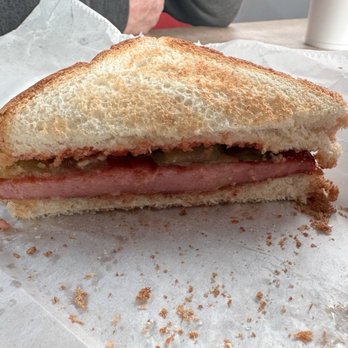 Beaches Burgers - Inside of the grilled bologna sandwich with pickles and ketchup - American Near Me - Ocean Isle Beach, North Carolina