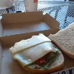 a sandwich in a box on a table a sandwich in a box on a table