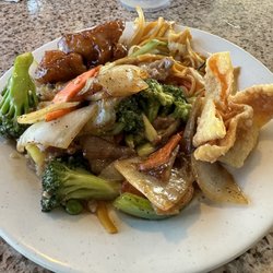 Chinese Buffet - Peppered beef and vegetables over spicy fried rice, crab Rangoon and general tso's chicken