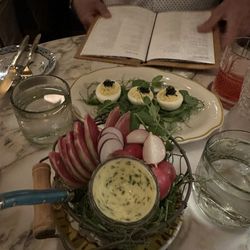 The Franklin - Radishes with tarragon butter and deviled eggs with caviar