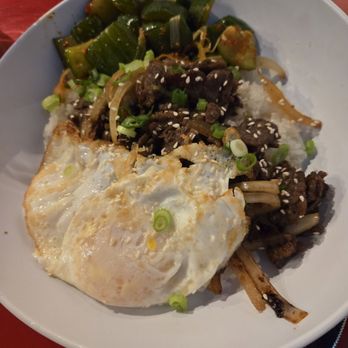 Tender Lovin Chix - Bulgogi steak with eggs over rice and cucumber kimchi - Food Trucks Near Me - Minneapolis, Minnesota Tender Lovin Chix - Bulgogi steak with eggs over rice and cucumber kimchi - Food Trucks Near Me - Minneapolis, Minnesota