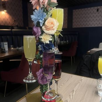 Dolly's - Mimosa tower. So pretty! - Cocktail Bars Near Me - New York, New York
